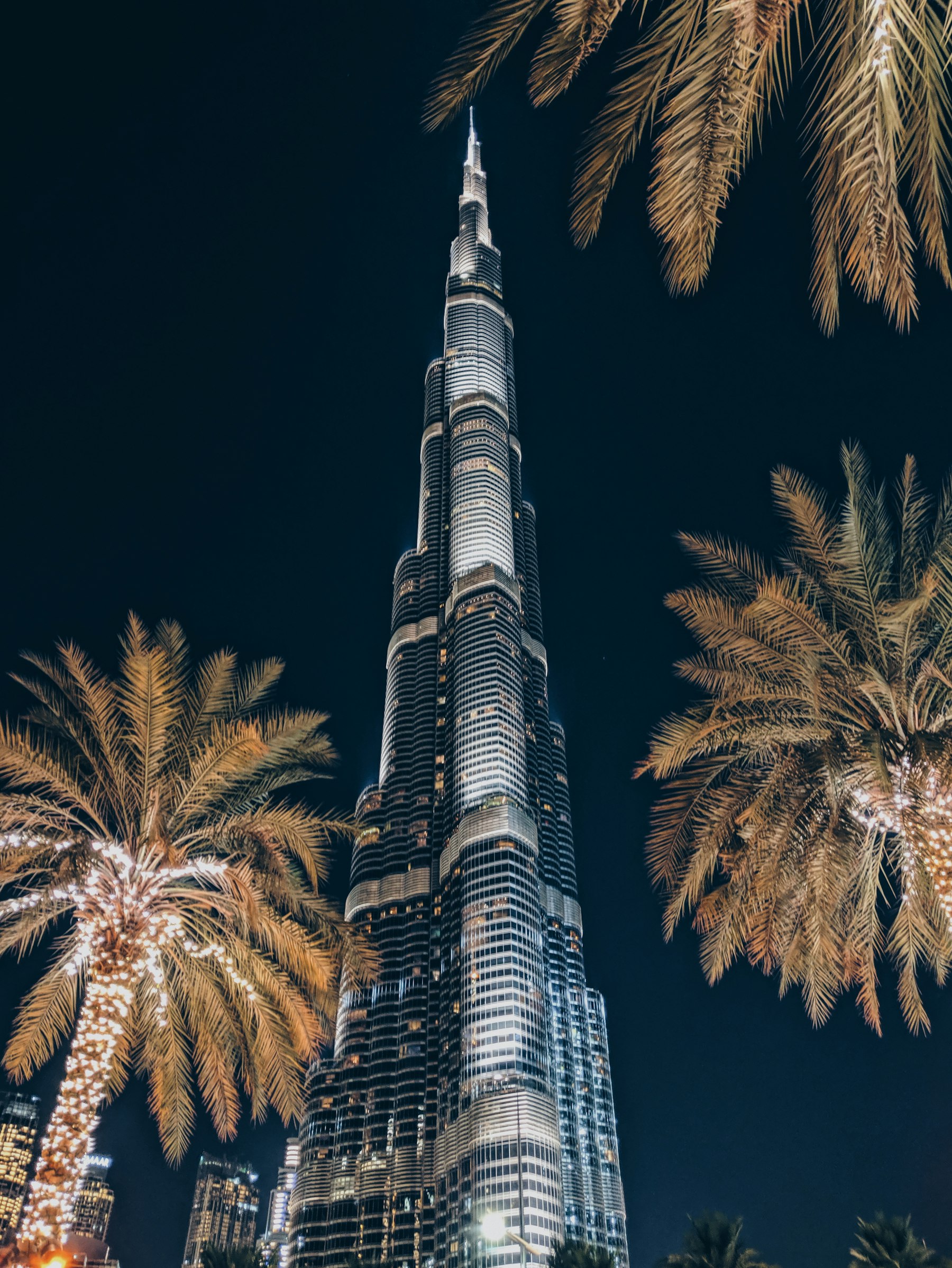 Looking up at Burj Khalifa against the evening sky