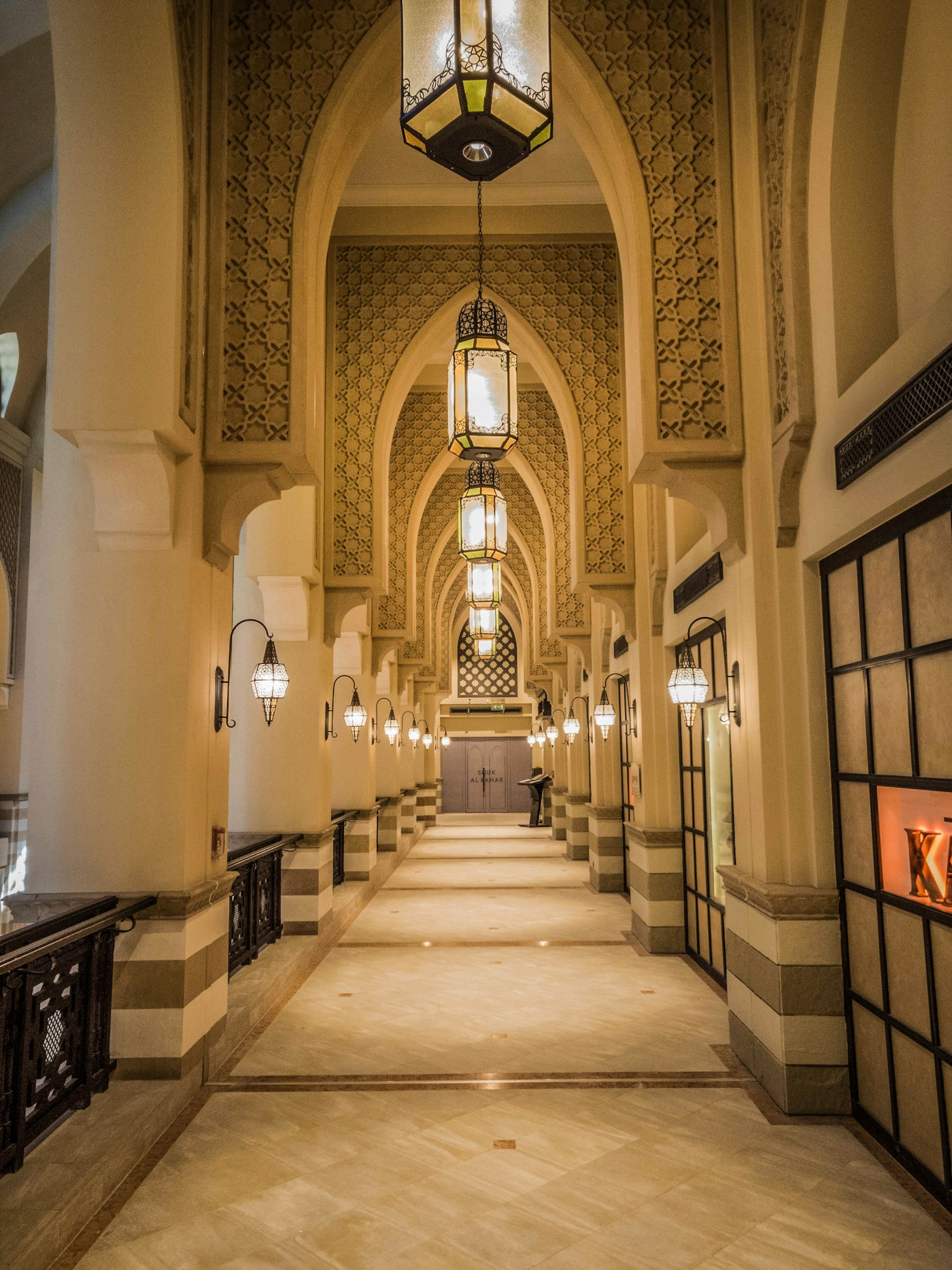 A lantern-lit Arabesque arcade inside Souk Al Bahar